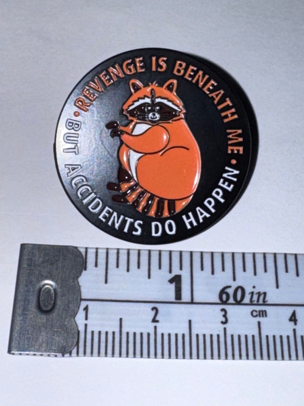 Revenge is beneath me but accidents do happen raccoon pin brooch